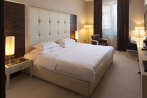 Interior of a hotel bedroom in the morning Interior of a hotel bedroom in the morning